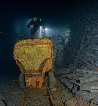 Mine cart and pile of slate. Photo by Kurt Storms.